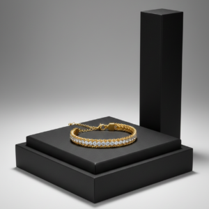 Luxury gold chain bracelet with a row of sparkling white crystals on a black pedestal.