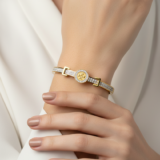 Tory Burch premium stainless steel handcuff bracelet with polished luxury finish