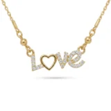 Gold script necklace spelling "Love" with a paved crystal heart as the letter O.