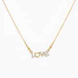 Two gold-plated necklaces with Love and Butterfly charms on a black gift box.