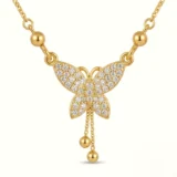 Gold butterfly necklace with diamond pave and hanging chain tassels.