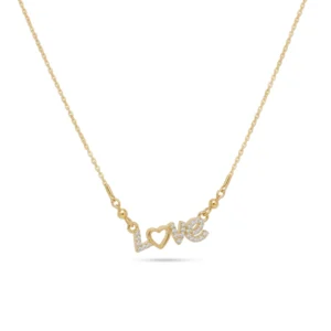 Gold script necklace spelling "Love" with a paved crystal heart as the letter O.
