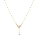 Gold butterfly necklace with diamond pave and hanging chain tassels.