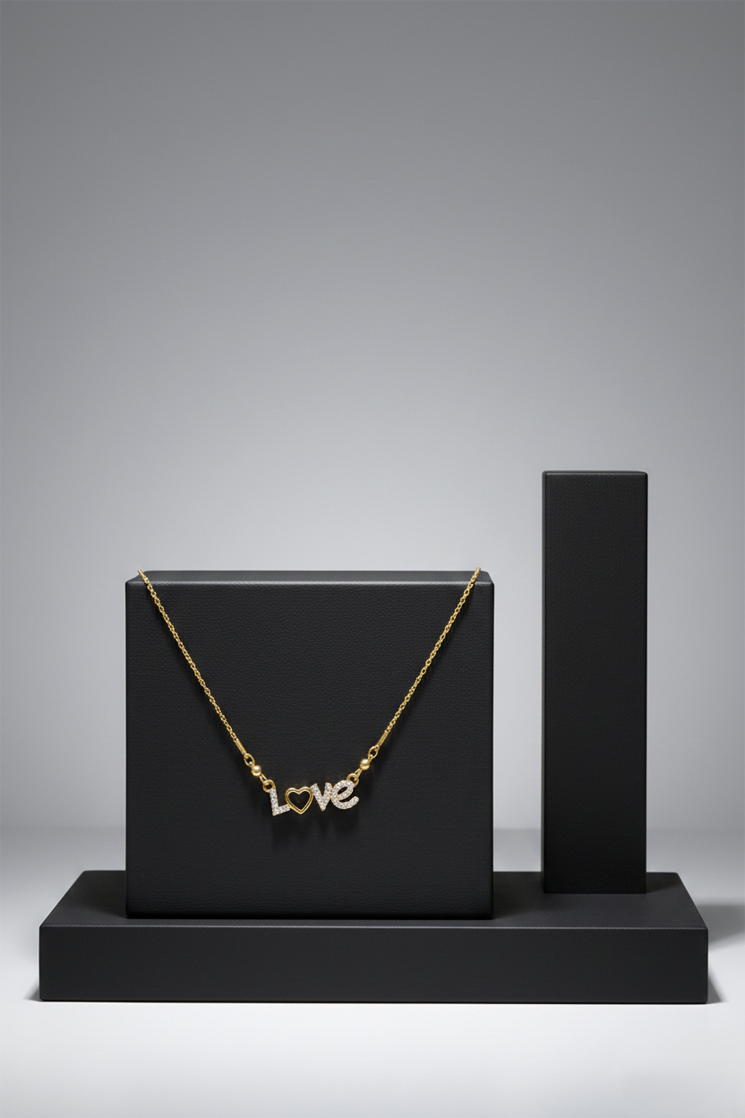 Gold "LOVE" Heart Pendant Necklace Gold chain necklace featuring a diamond-encrusted "LOVE" pendant with a heart-shaped "O" on a black display stand.