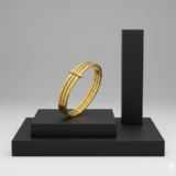 A luxury gold-finish triple-band bracelet displayed on a modern black geometric pedestal.