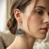 Vintage oxidized silver jhumka earrings with paisley detailing