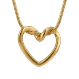 Gold open-heart pendant necklace with a knotted snake chain.